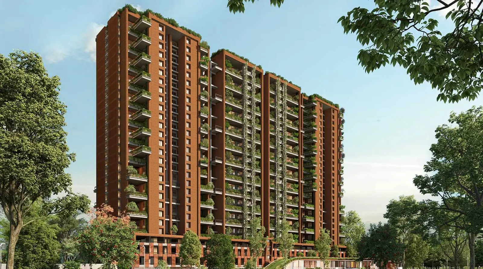 Terracotta-clad towers of Total Environment Butterfly of Dreams with planted balconies on Sarjapur Road, Bengaluru
